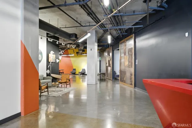 a view of water heater room with couch