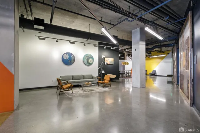 a view of a gym with wooden floor