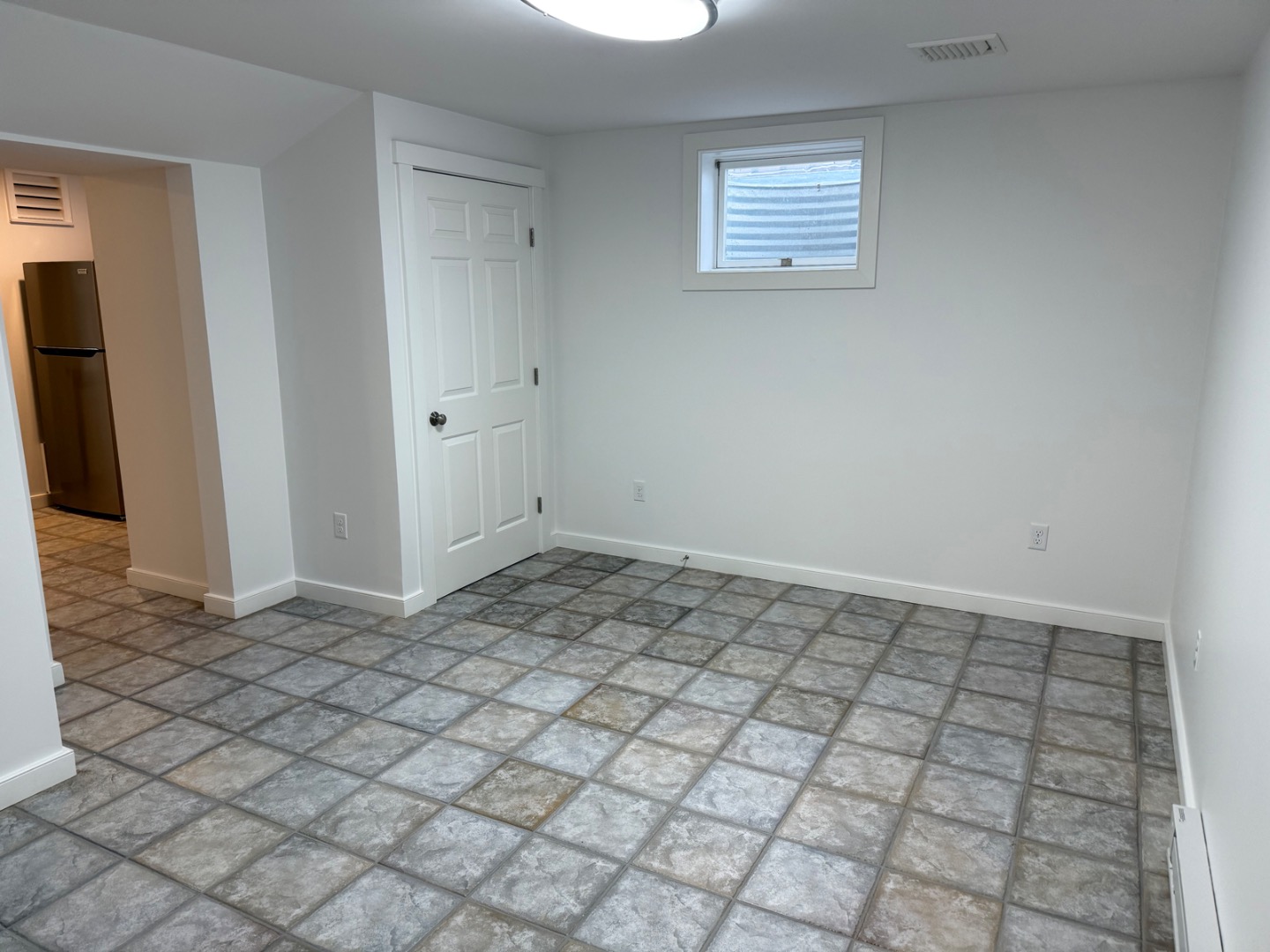 106 Old South Road, Unit A B Nantucket, MA 02554 - Photo 21 of 24 a view of an empty room and window