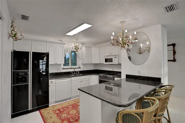 a bathroom with a toilet and shower