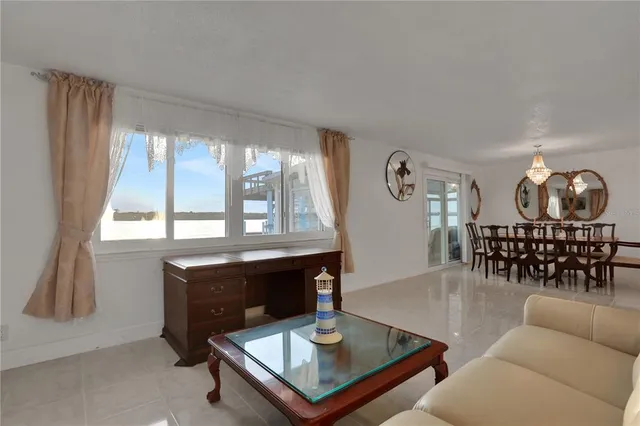 a view of backyard with a patio and a yard