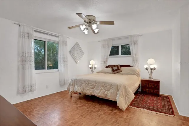 a view of a swimming pool with an outdoor seating