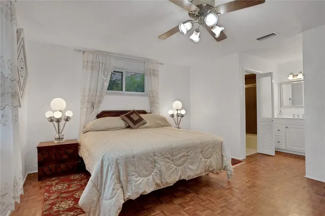 a room with furniture and wooden floor