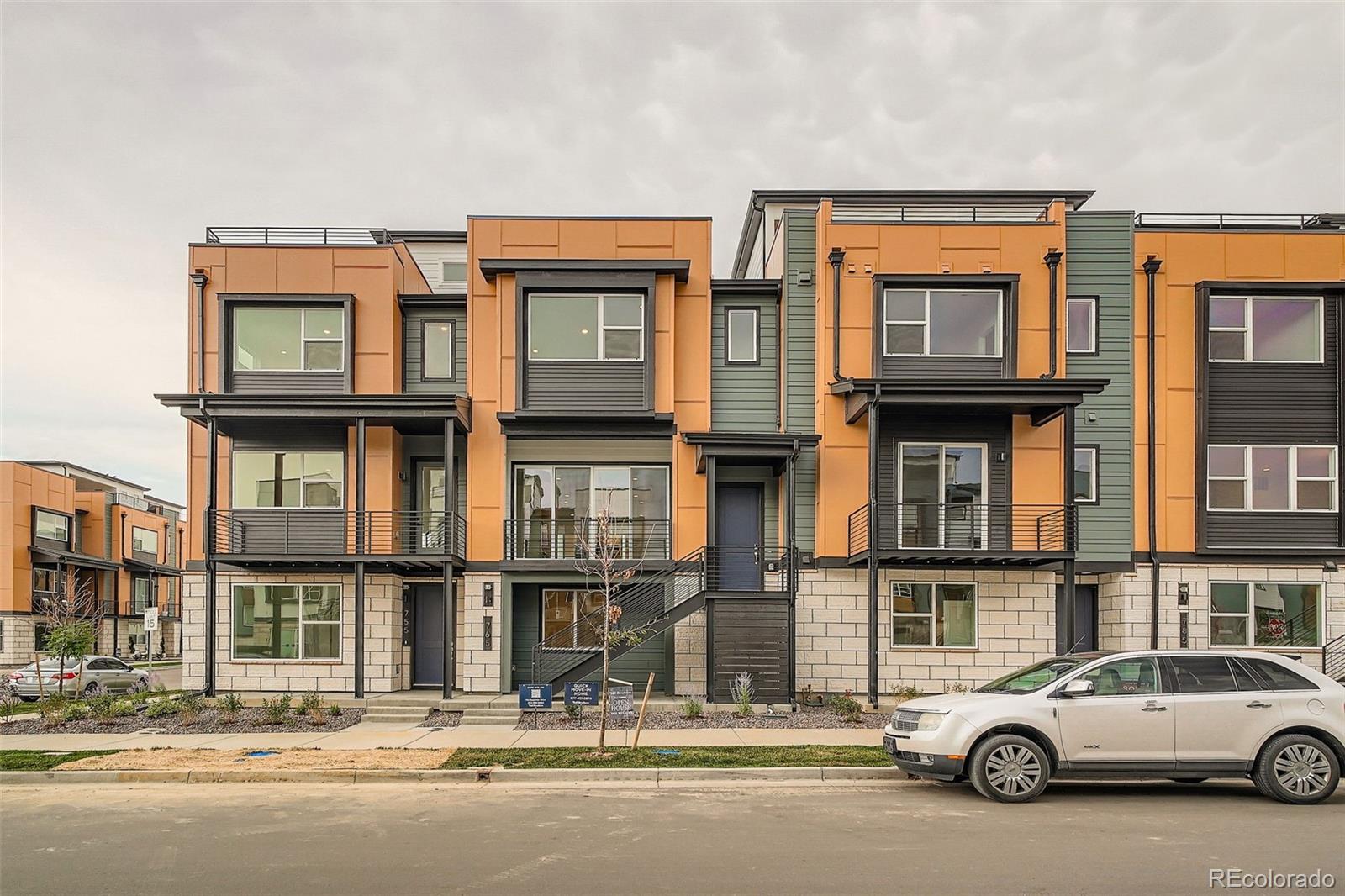 765 Superior Drive Superior, CO 80027 - Photo 2 of 32 a car parked in front of a building