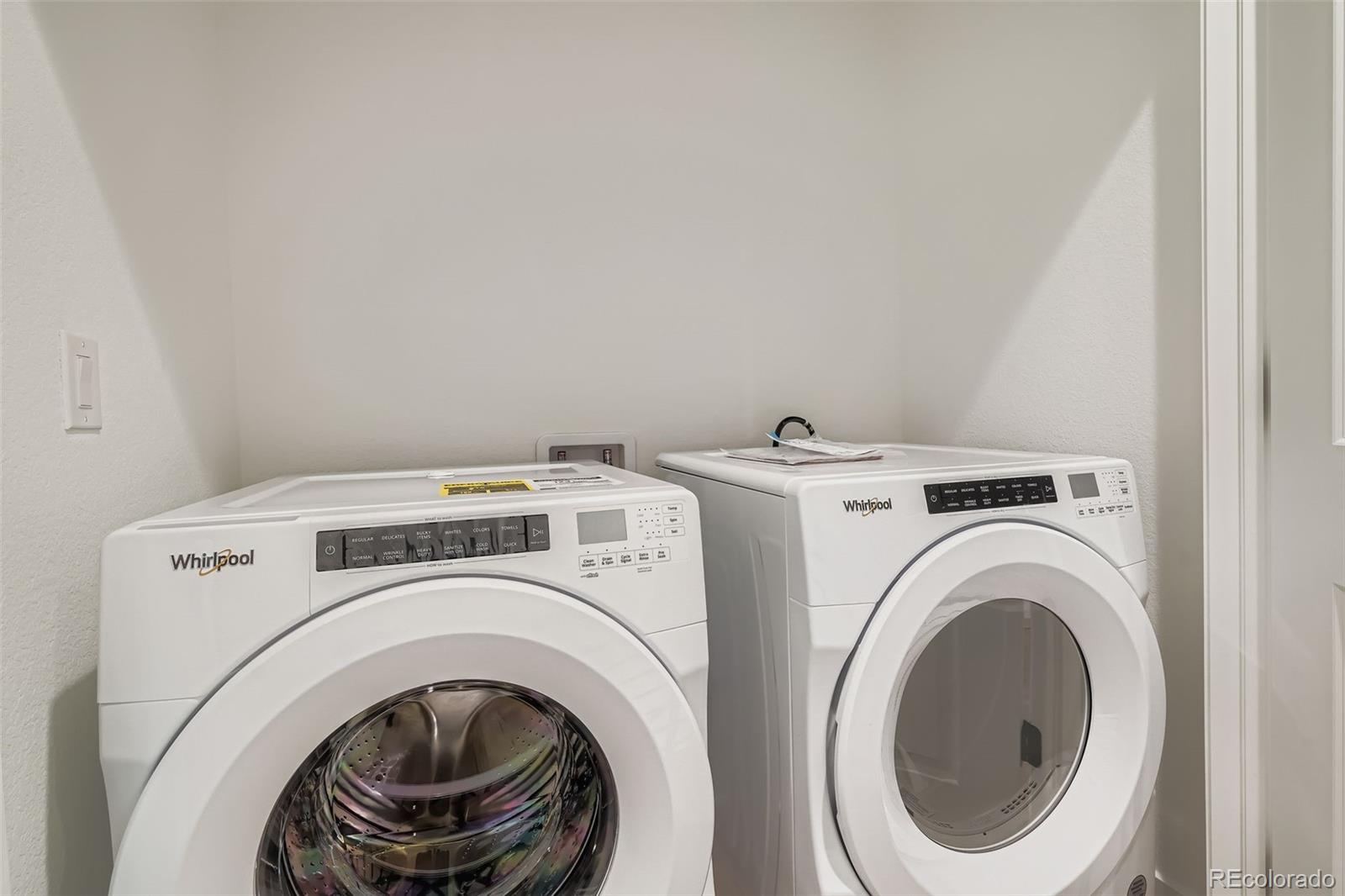 765 Superior Drive Superior, CO 80027 - Photo 23 of 32 a utility room with dryer and washer