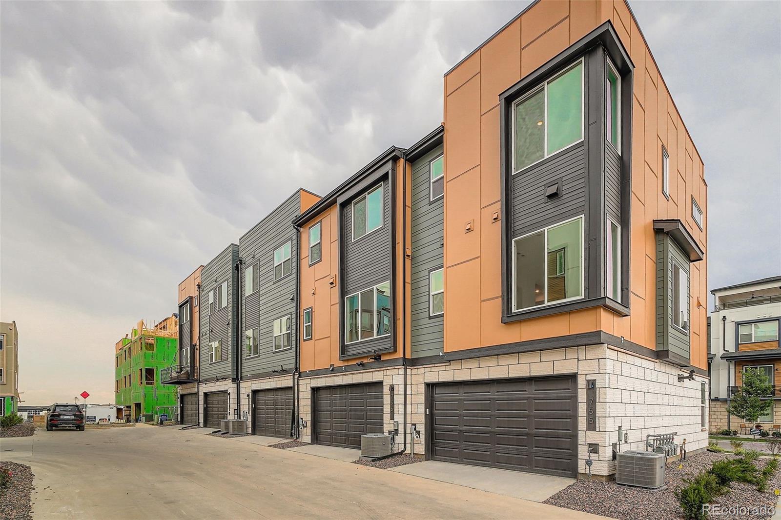 765 Superior Drive Superior, CO 80027 - Photo 28 of 32 a front view of a building with a street