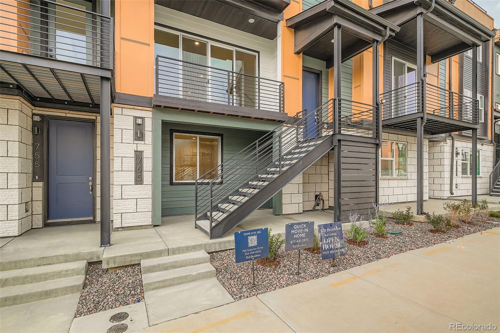 765 Superior Drive Superior, CO 80027 - Photo 3 of 32 a front view of a house with a garden