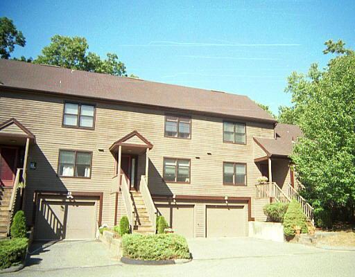 19 Rolling Ridge Road, Unit 19 Monroe, CT 06468 - Photo 1 of 1 a front view of a house with a yard