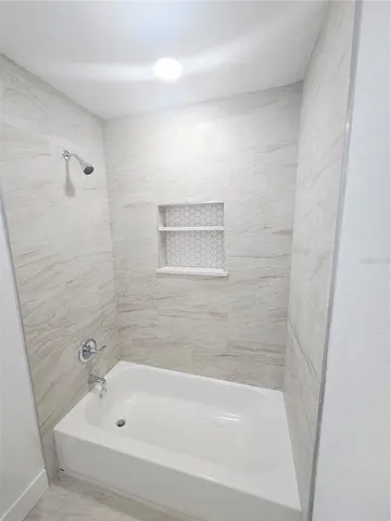 a bathroom with a bathtub