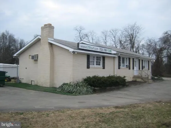 a white house with a outdoor space