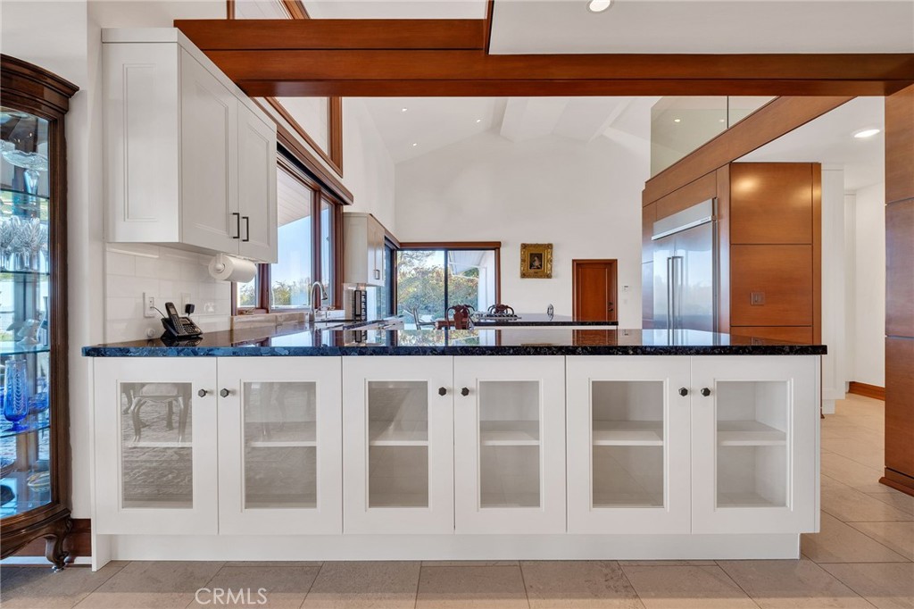 15 Caballeros Road Rolling Hills, CA 90274 - Photo 11 of 70 a kitchen with stainless steel appliances granite countertop a stove and cabinets