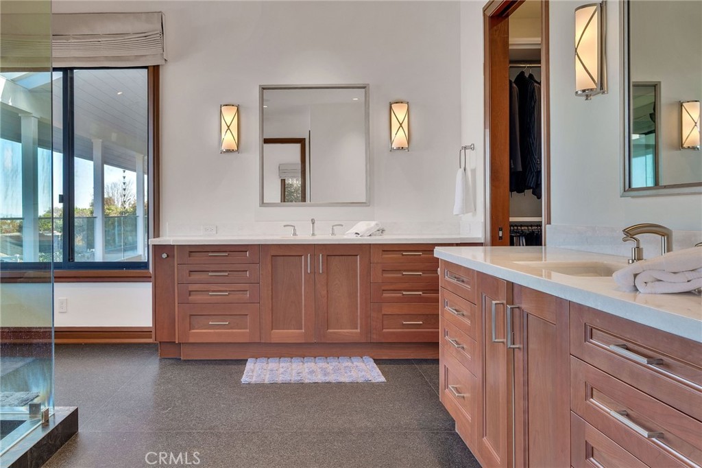 15 Caballeros Road Rolling Hills, CA 90274 - Photo 35 of 70 a bathroom with a granite countertop sink and a mirror