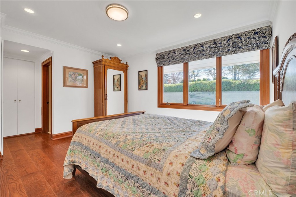 15 Caballeros Road Rolling Hills, CA 90274 - Photo 42 of 70 a bed sitting in a bedroom next to a window