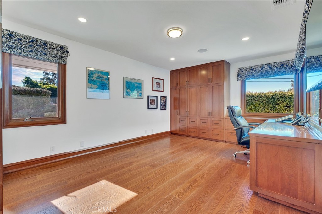 15 Caballeros Road Rolling Hills, CA 90274 - Photo 47 of 70 a view of an empty room with wooden floor and a window