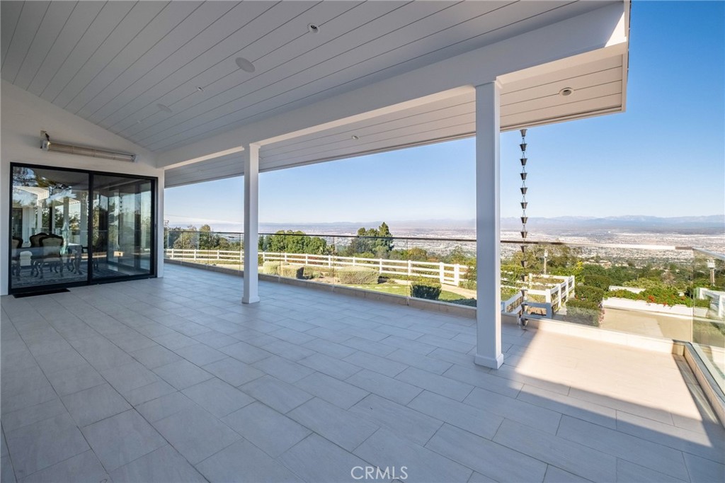 15 Caballeros Road Rolling Hills, CA 90274 - Photo 53 of 70 a view of an ocean and a floor to ceiling window