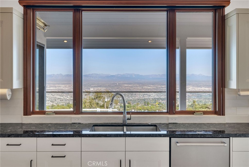 15 Caballeros Road Rolling Hills, CA 90274 - Photo 10 of 70 a kitchen with granite countertop a window and a sink