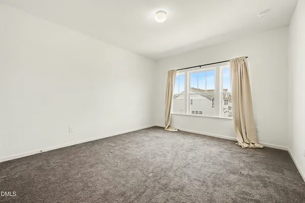 an empty room with window