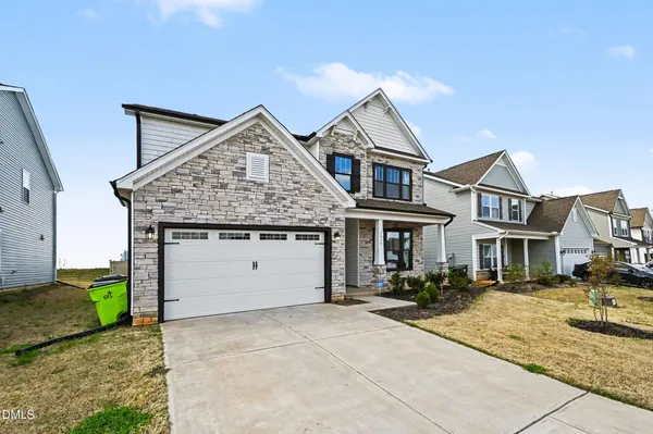 a front view of a house with entertaining space