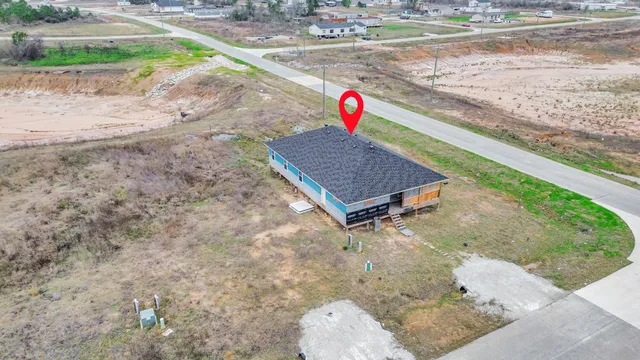 a backyard of a house with lots of green space
