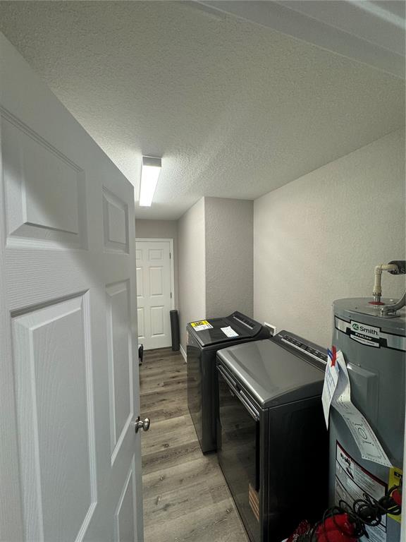 13183 Southwest 113th Place Dunnellon, FL 34432 - Photo 13 of 22 a utility room with dryer and washer