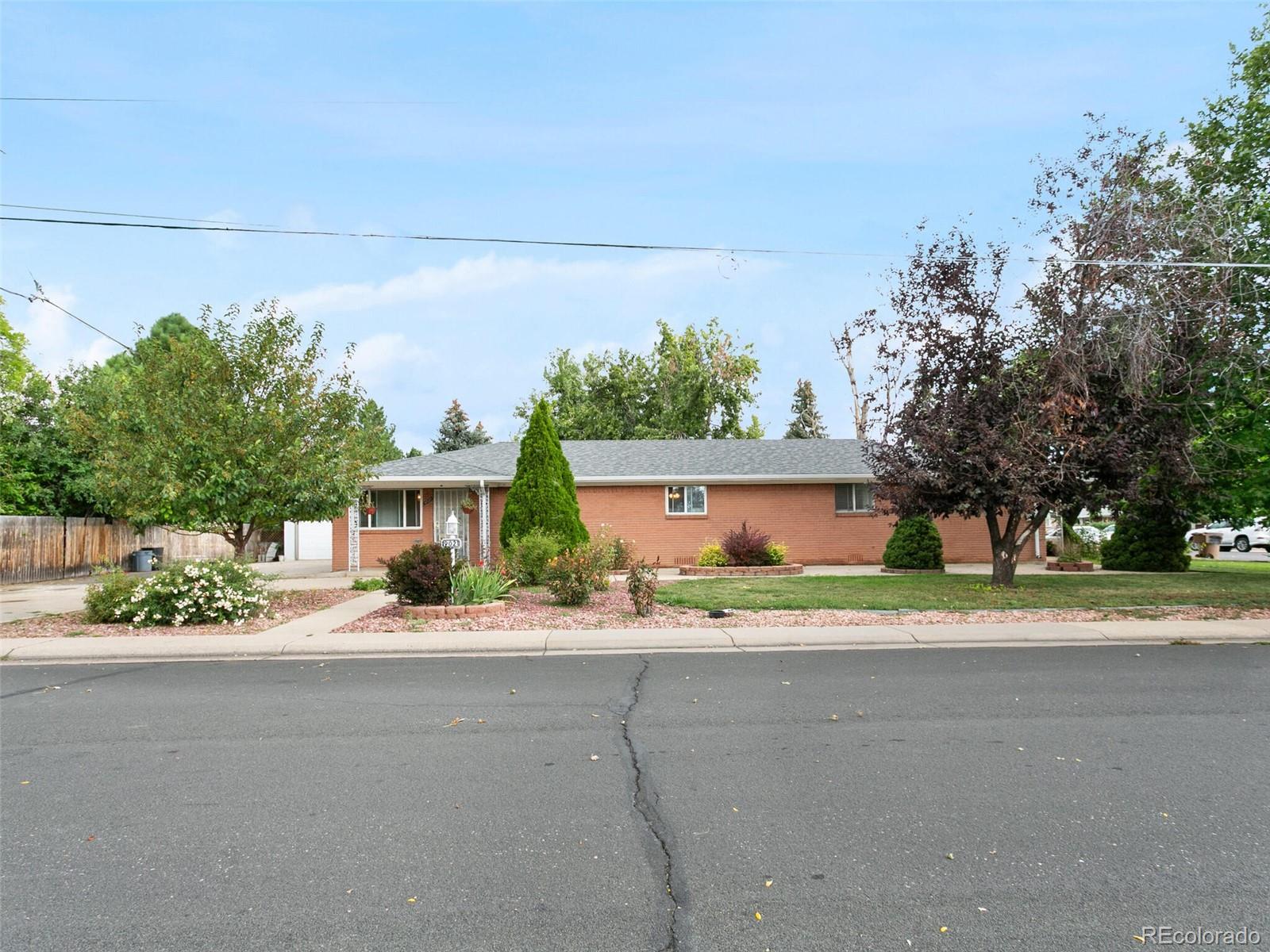 front view of a house with a street