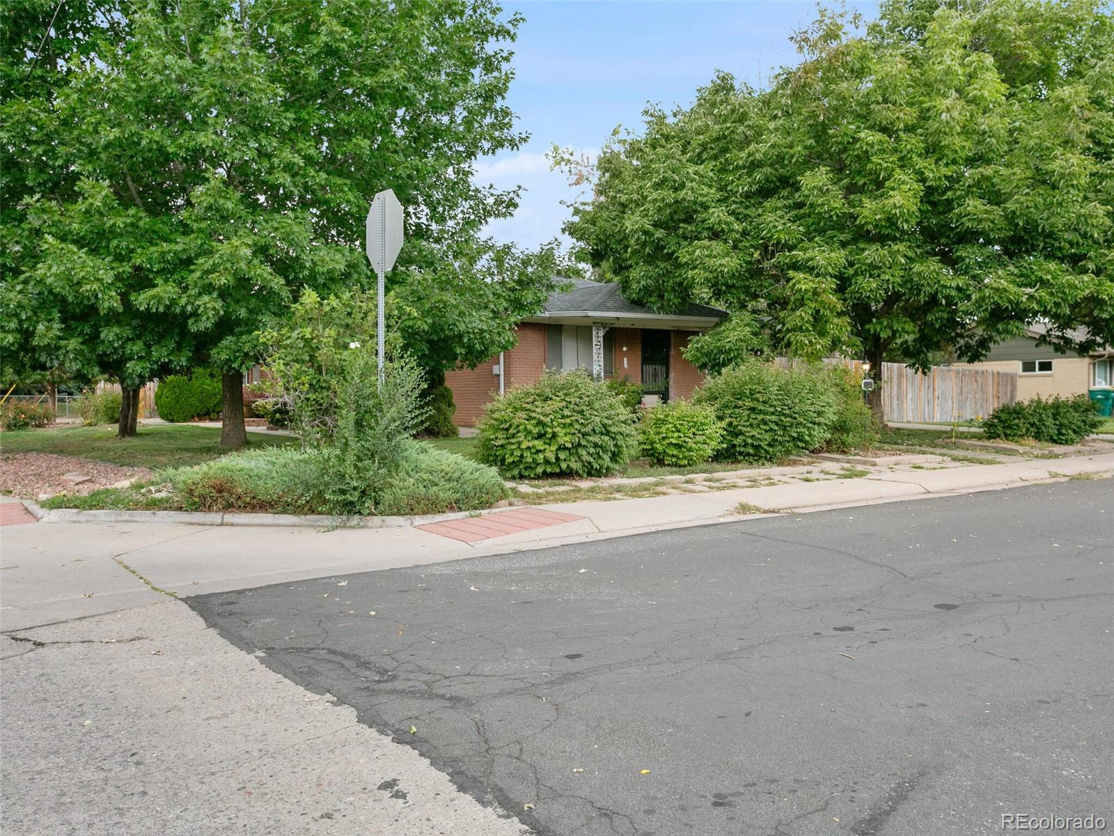 4615 Field Street Wheat Ridge, CO 80033 - Photo 21 of 39 a view of a house with a street