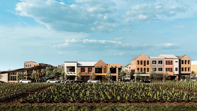 a front view of a house with a yard and balcony