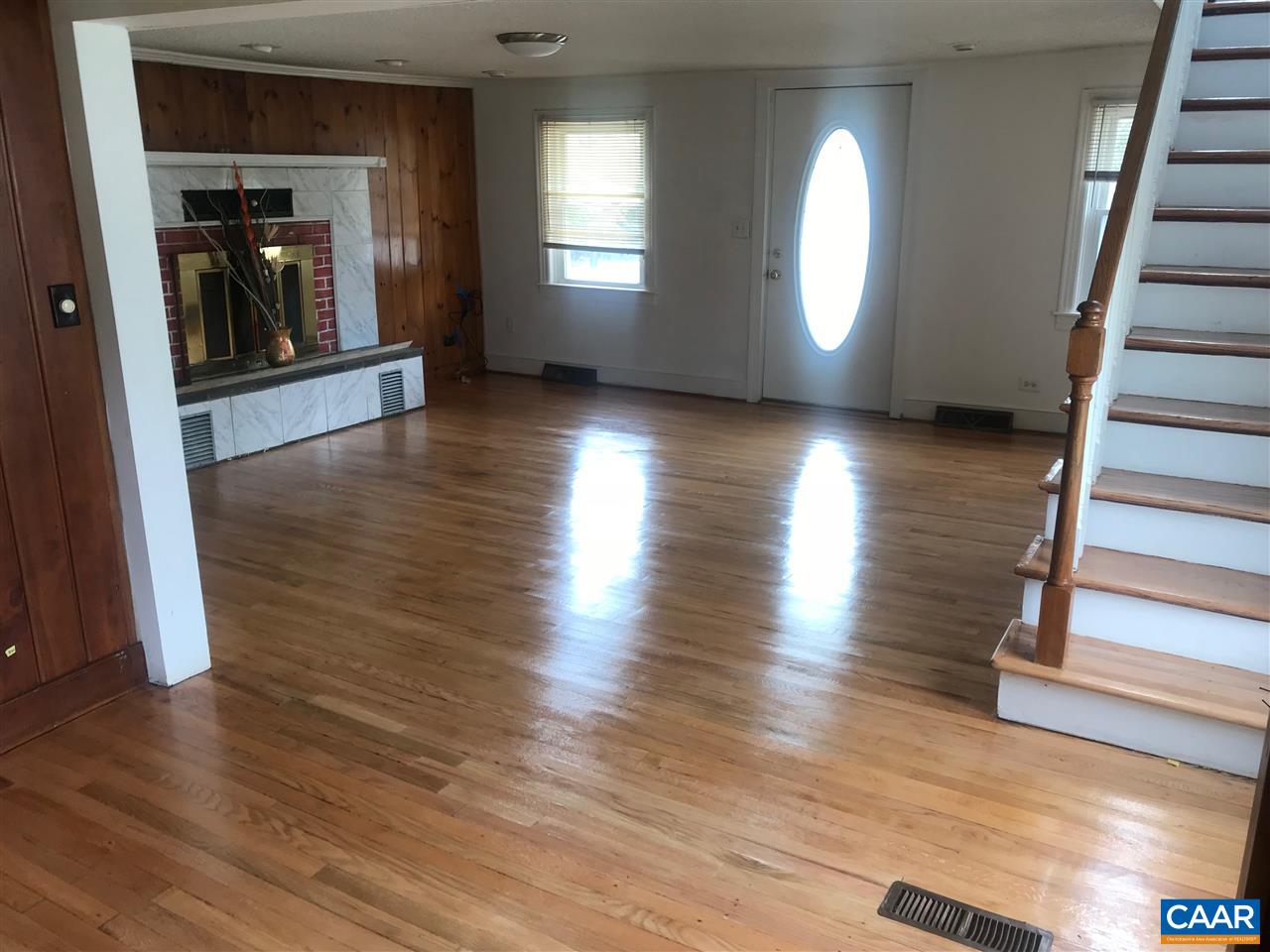 5596 Three Notch'd Road Crozet, VA 22932 - Photo 4 of 11 a view of an empty room with wooden floor and a window