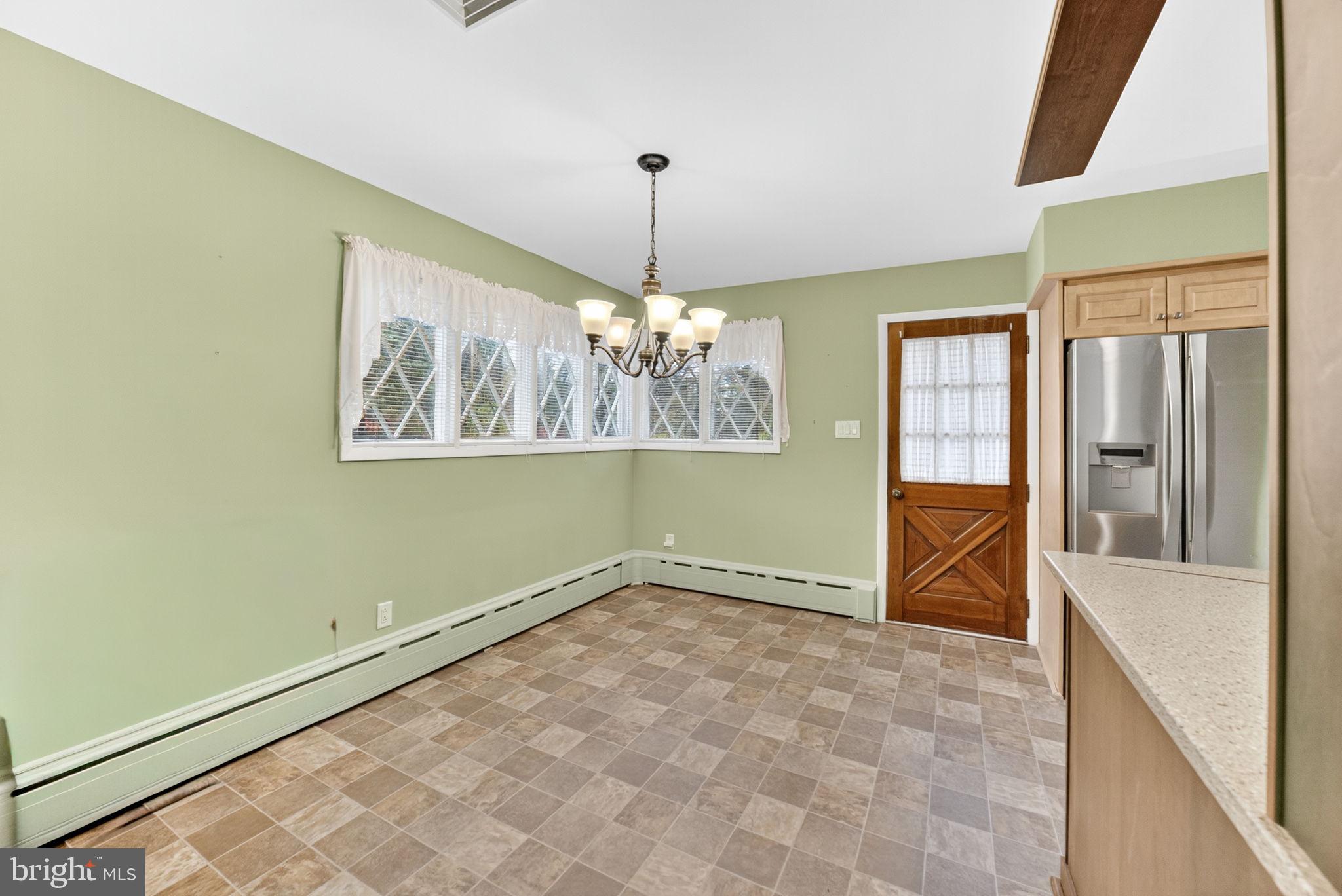 2304 Black River Road Bethlehem, PA 18015 - Photo 17 of 48 a view of an empty room with window and chandelier fan