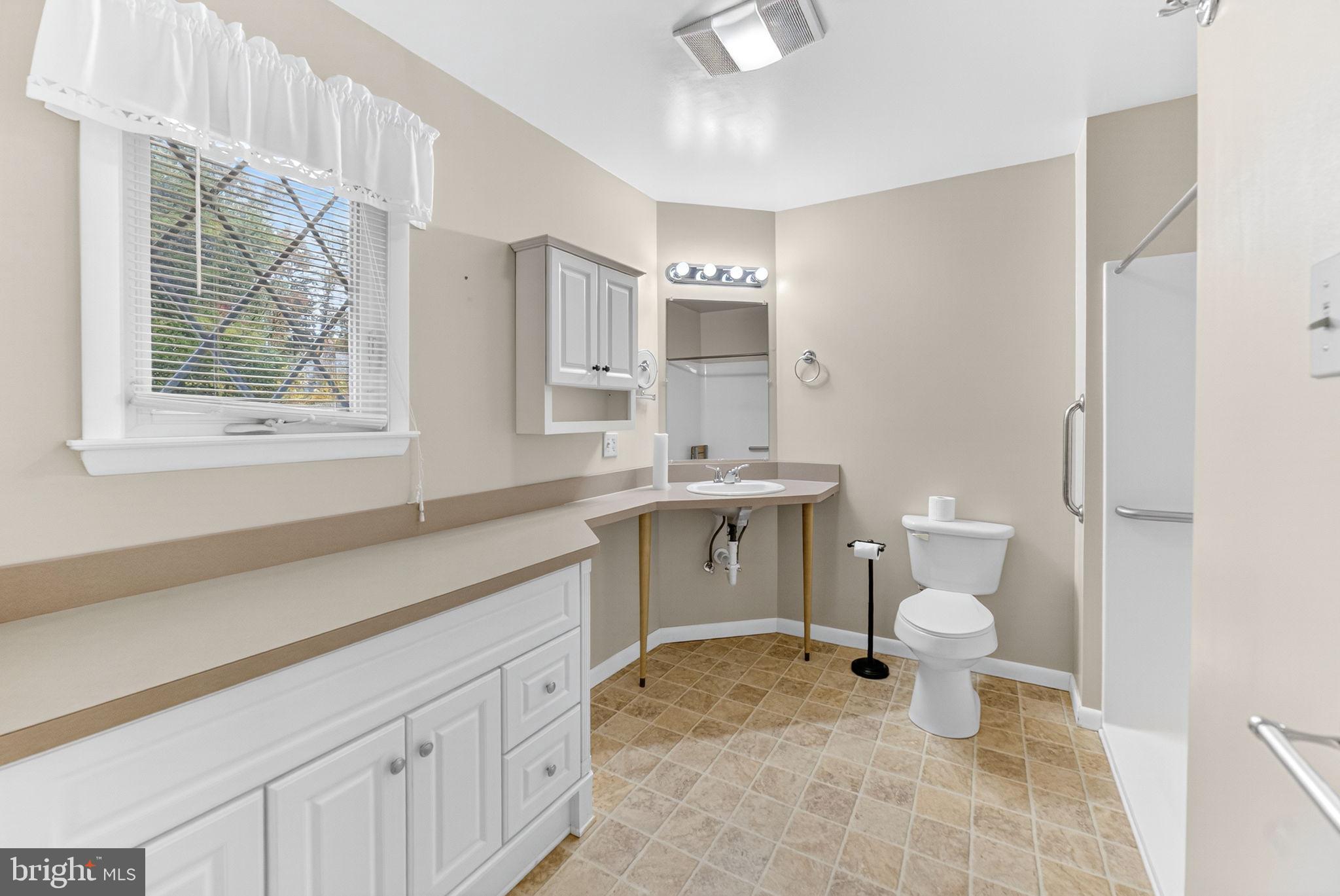 2304 Black River Road Bethlehem, PA 18015 - Photo 29 of 48 a bathroom with a sink toilet vanity and granite