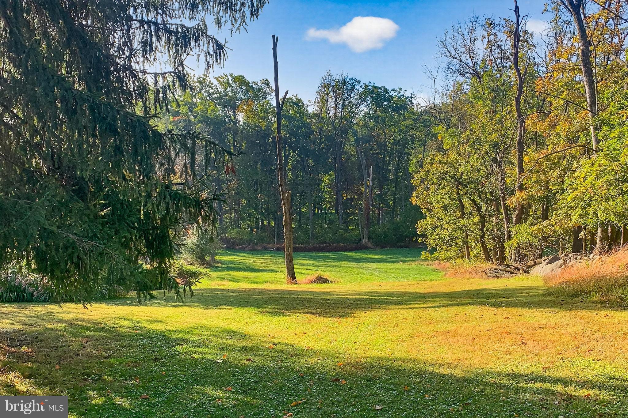 2304 Black River Road Bethlehem, PA 18015 - Photo 3 of 48 a view of a swimming pool with an outdoor space and seating area