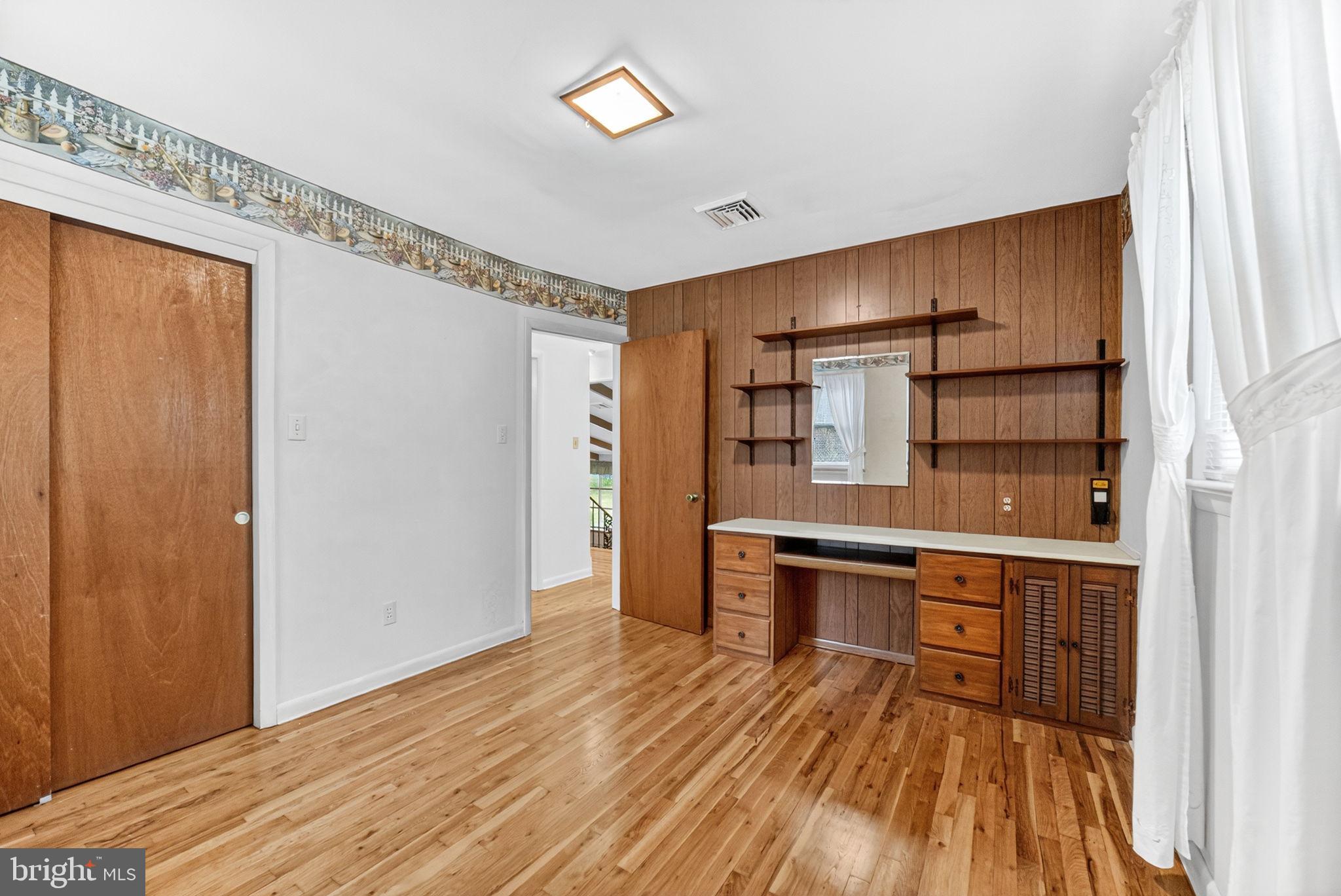 2304 Black River Road Bethlehem, PA 18015 - Photo 37 of 48 a view of a room with wooden floor and staircase