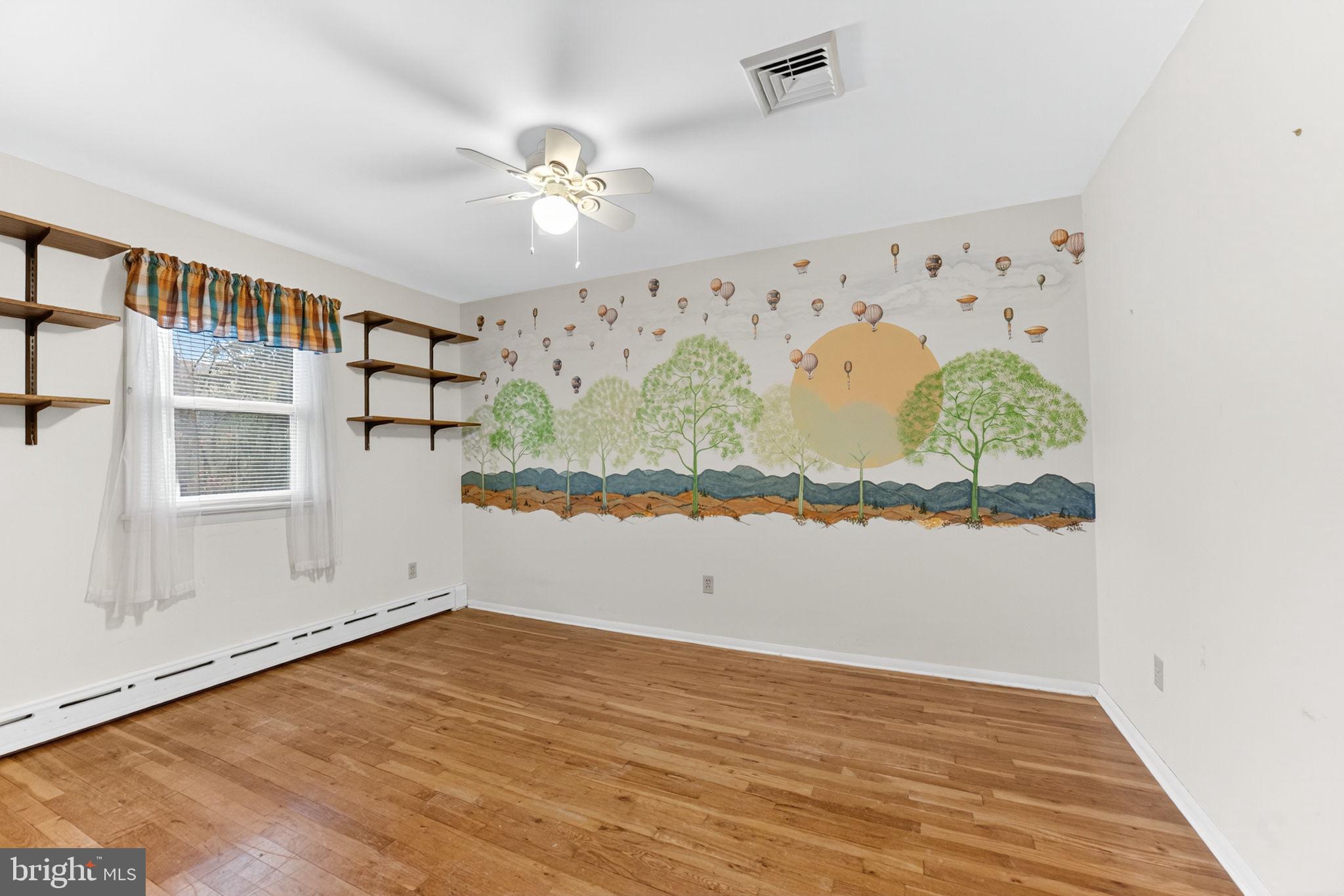 2304 Black River Road Bethlehem, PA 18015 - Photo 38 of 48 an empty room with wooden floor and windows