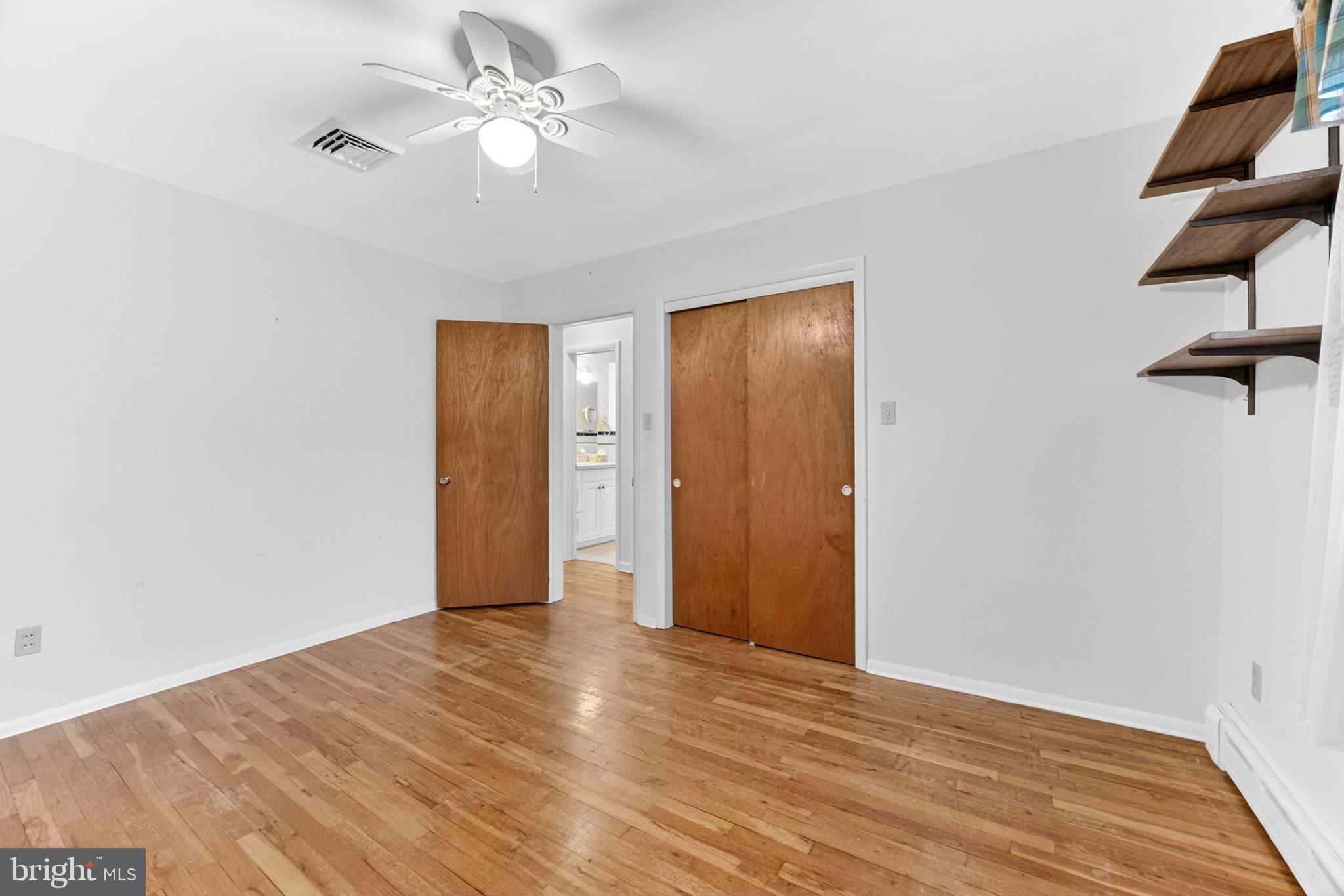 2304 Black River Road Bethlehem, PA 18015 - Photo 39 of 48 a view of an empty room with closet and a chandelier fan