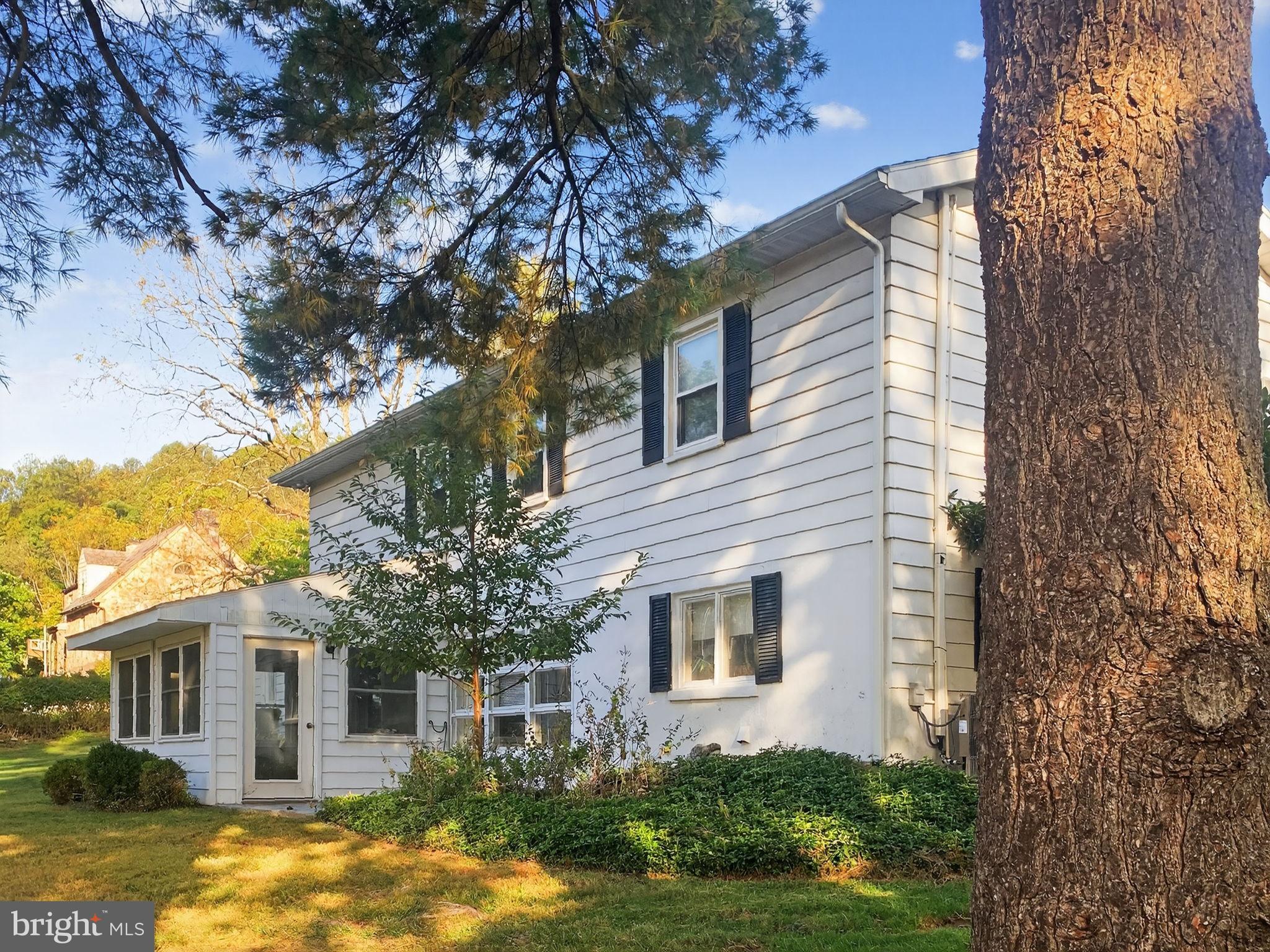 2304 Black River Road Bethlehem, PA 18015 - Photo 6 of 48 a front view of a house with yard and garage