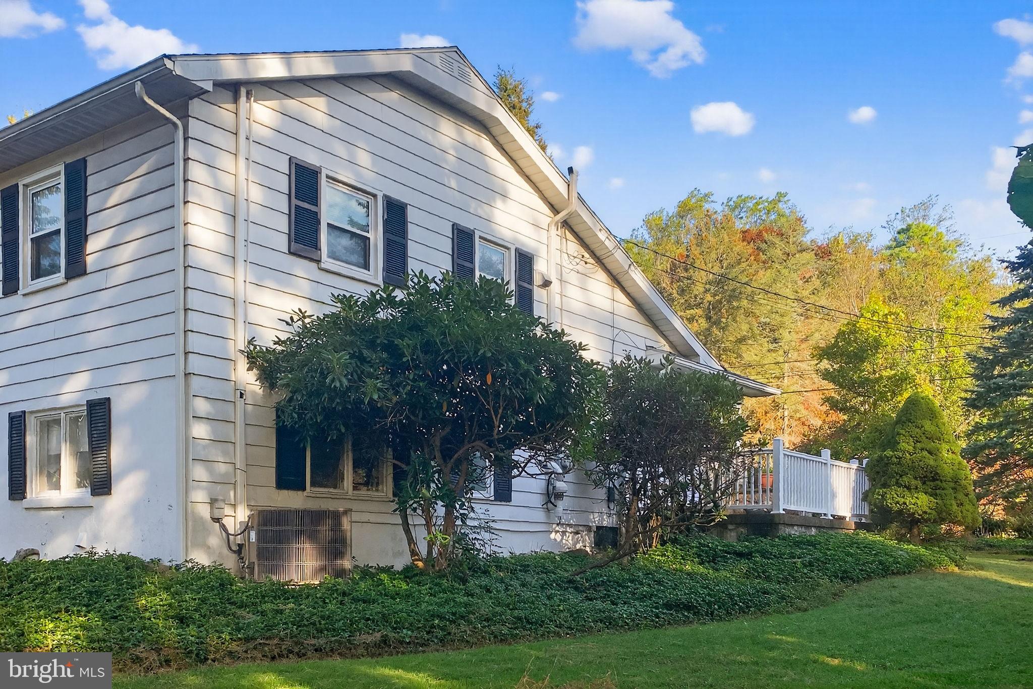 2304 Black River Road Bethlehem, PA 18015 - Photo 7 of 48 a front view of a house with garden