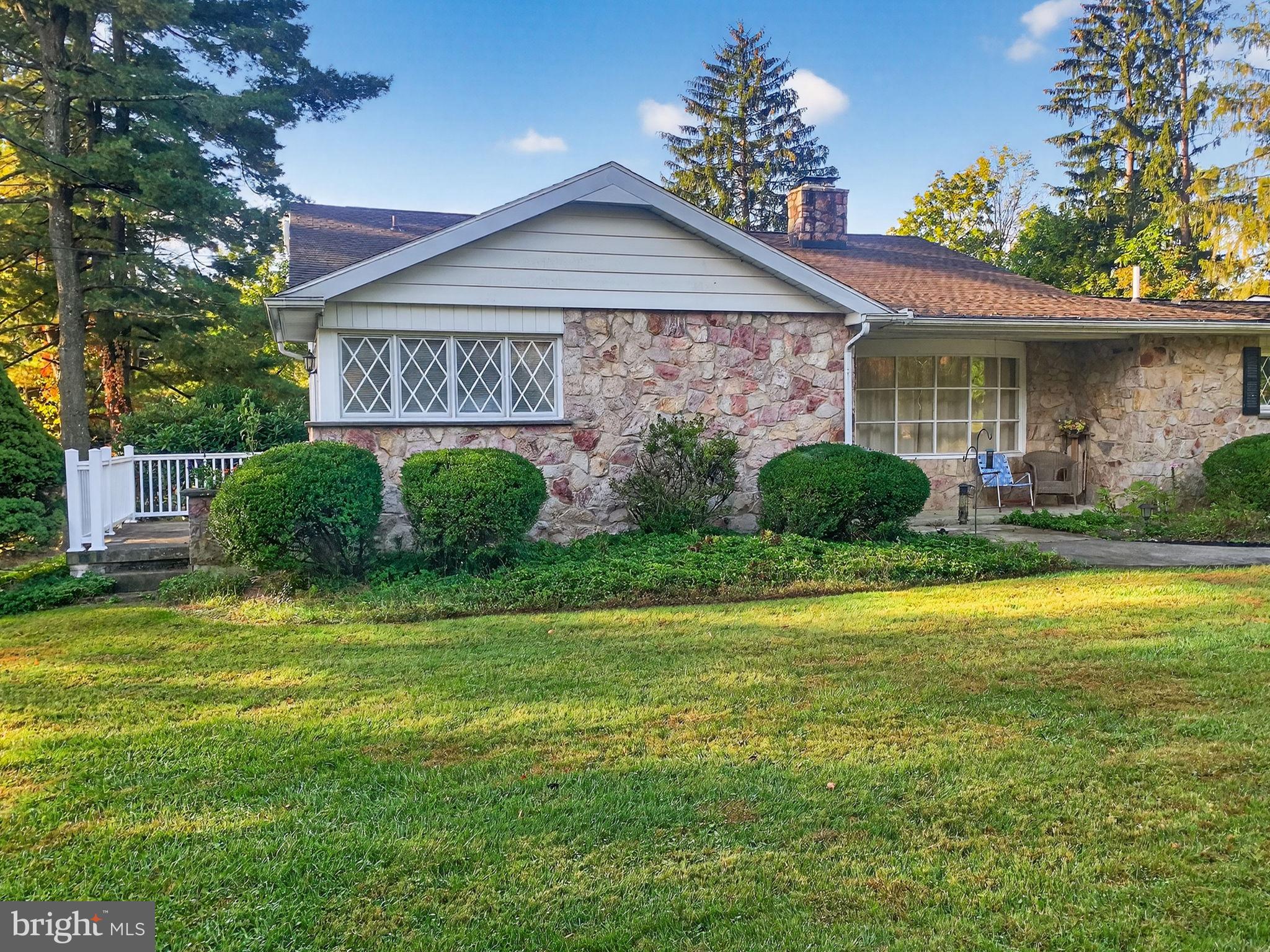2304 Black River Road Bethlehem, PA 18015 - Photo 9 of 48 a front view of a house with garden