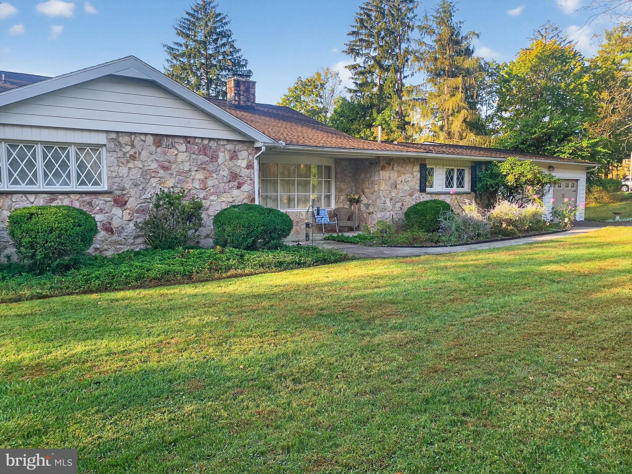 2304 Black River Road Bethlehem, PA 18015 - Photo 10 of 48 a view of a house with a yard and potted plants