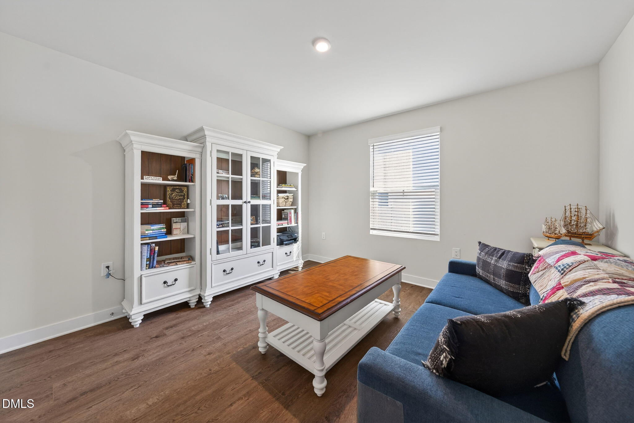 636 Jasmine Street Wendell, NC 27591 - Photo 20 of 30 a living room with furniture and a window