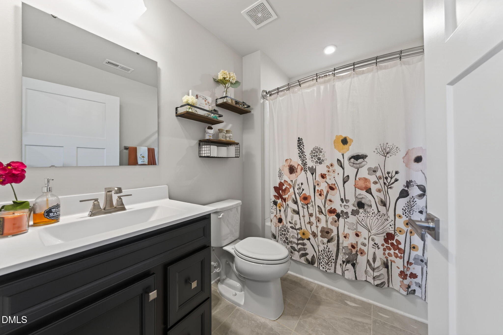 636 Jasmine Street Wendell, NC 27591 - Photo 22 of 30 a bathroom with a sink toilet and shower