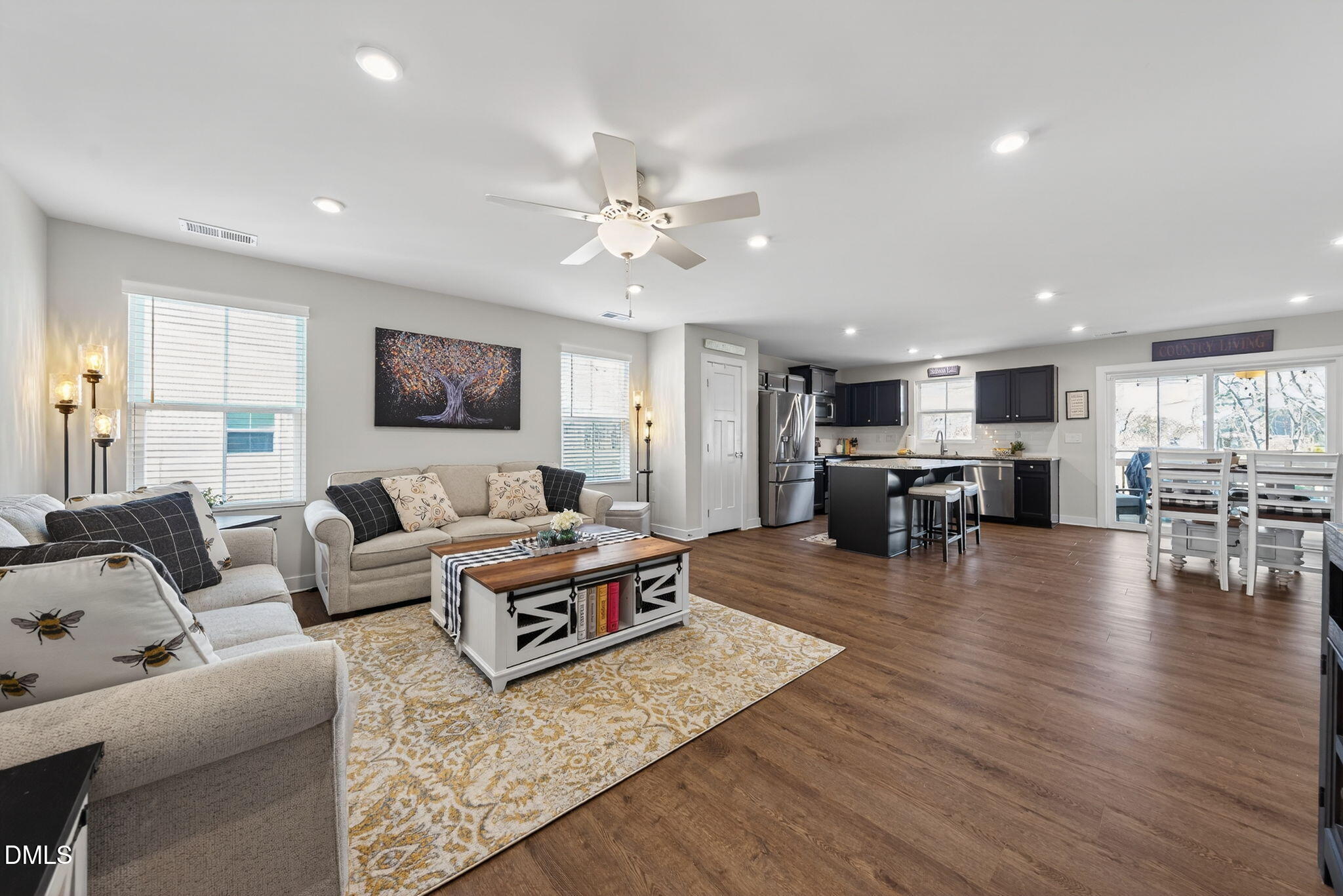 636 Jasmine Street Wendell, NC 27591 - Photo 5 of 30 a living room with furniture and wooden floor