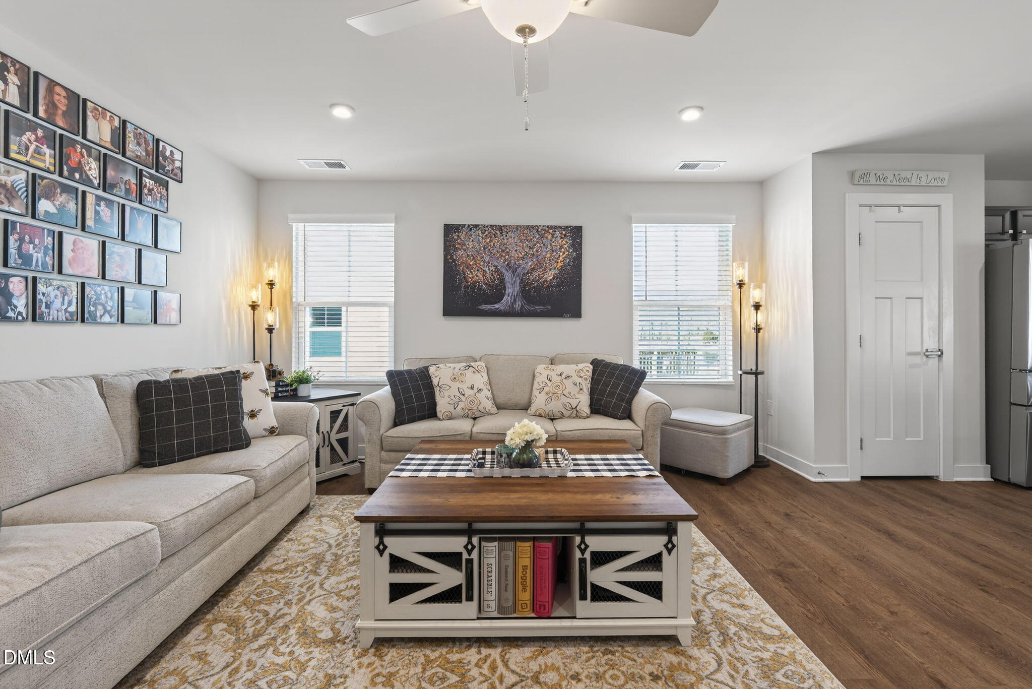 636 Jasmine Street Wendell, NC 27591 - Photo 6 of 30 a living room with furniture and wooden floor