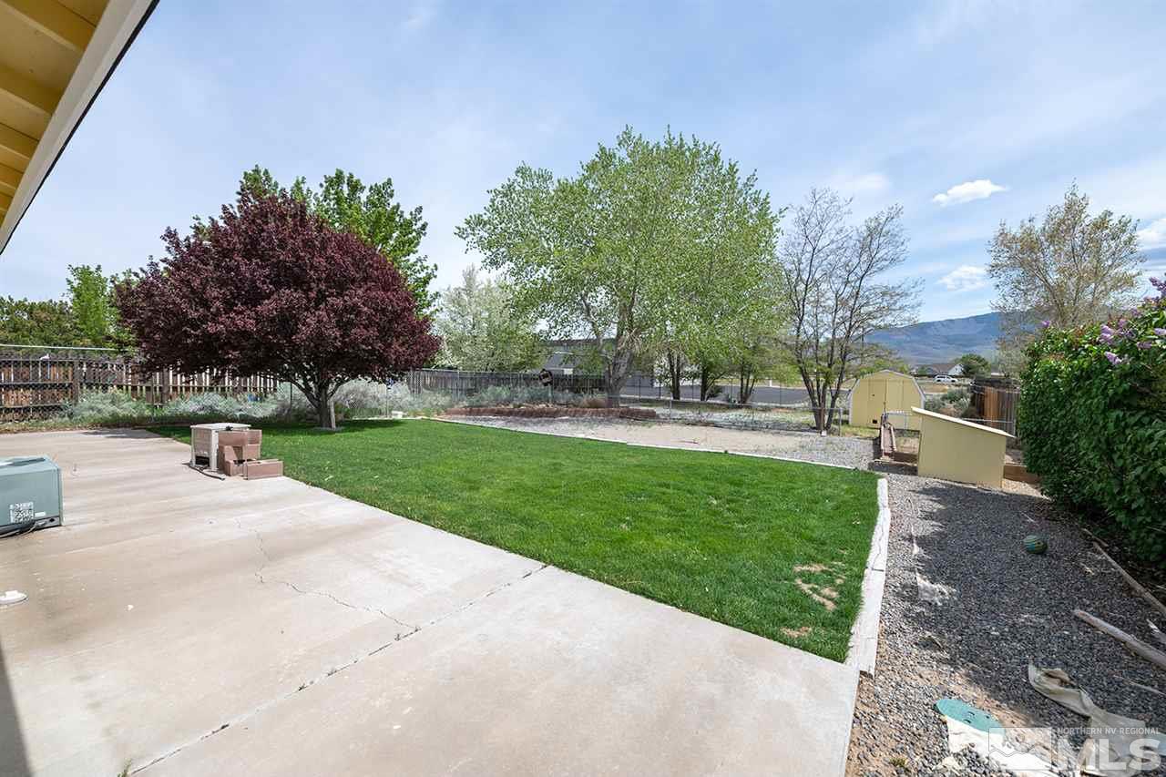 128 Empire Road Dayton, NV 89403 - Photo 3 of 20 a view of a park with swings and slides
