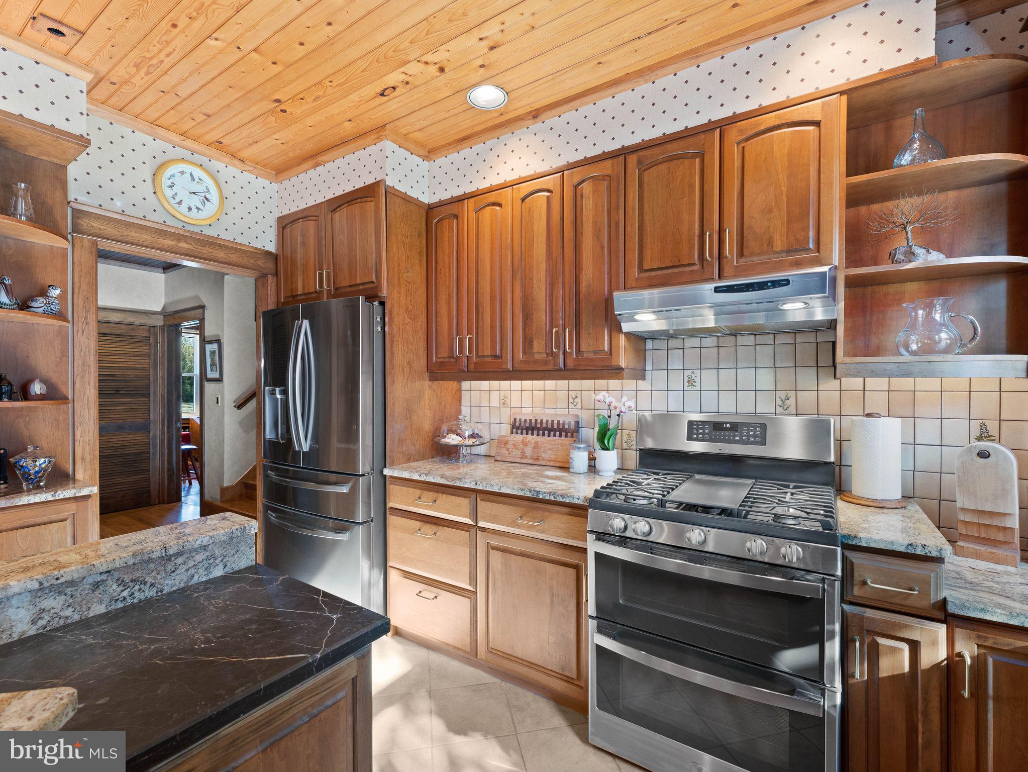 490 South Old Middletown Road Media, PA 19063 - Photo 22 of 79 a kitchen with a stove and a refrigerator