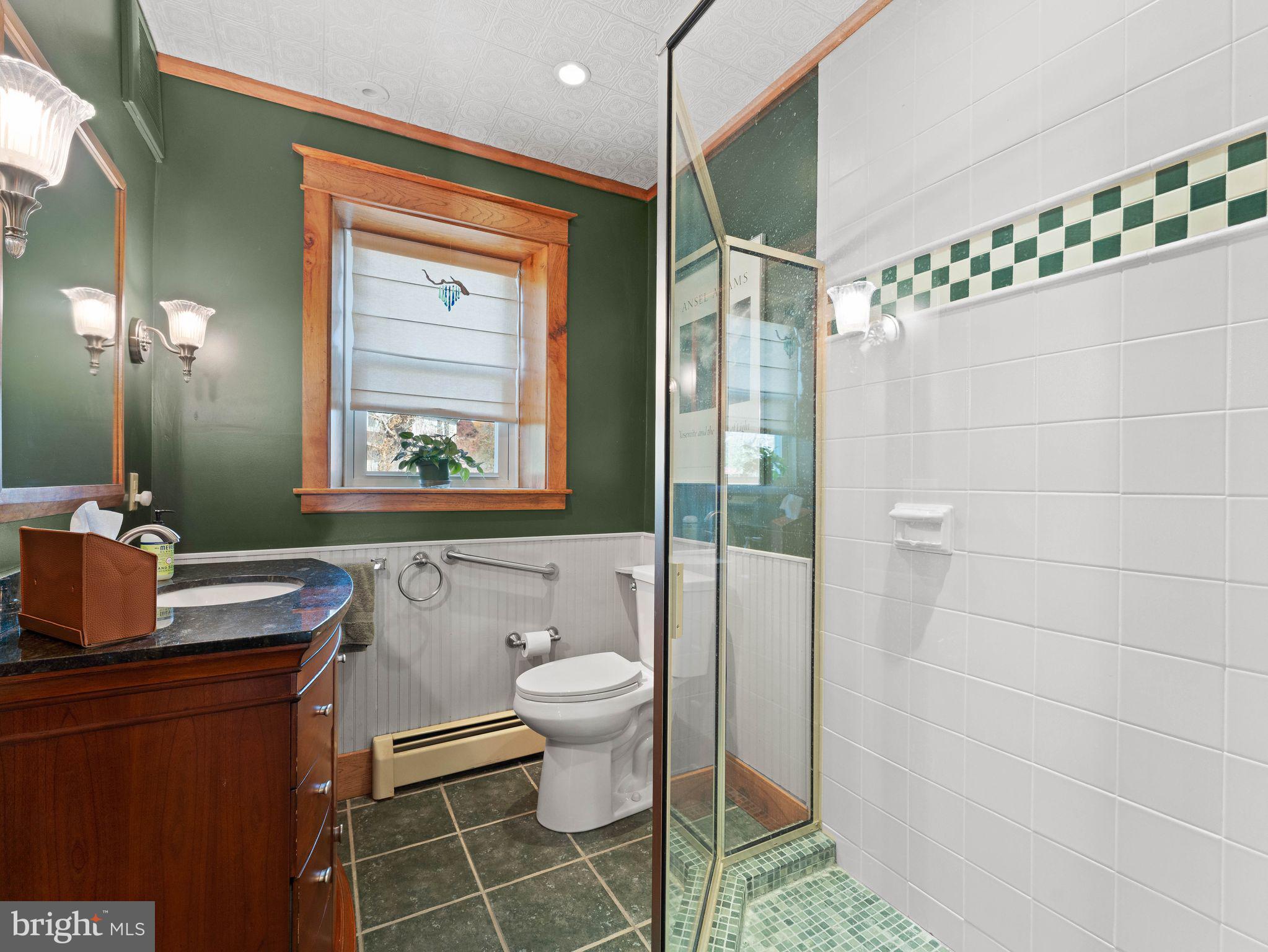 490 South Old Middletown Road Media, PA 19063 - Photo 32 of 79 a bathroom with a granite countertop sink toilet a mirror and shower