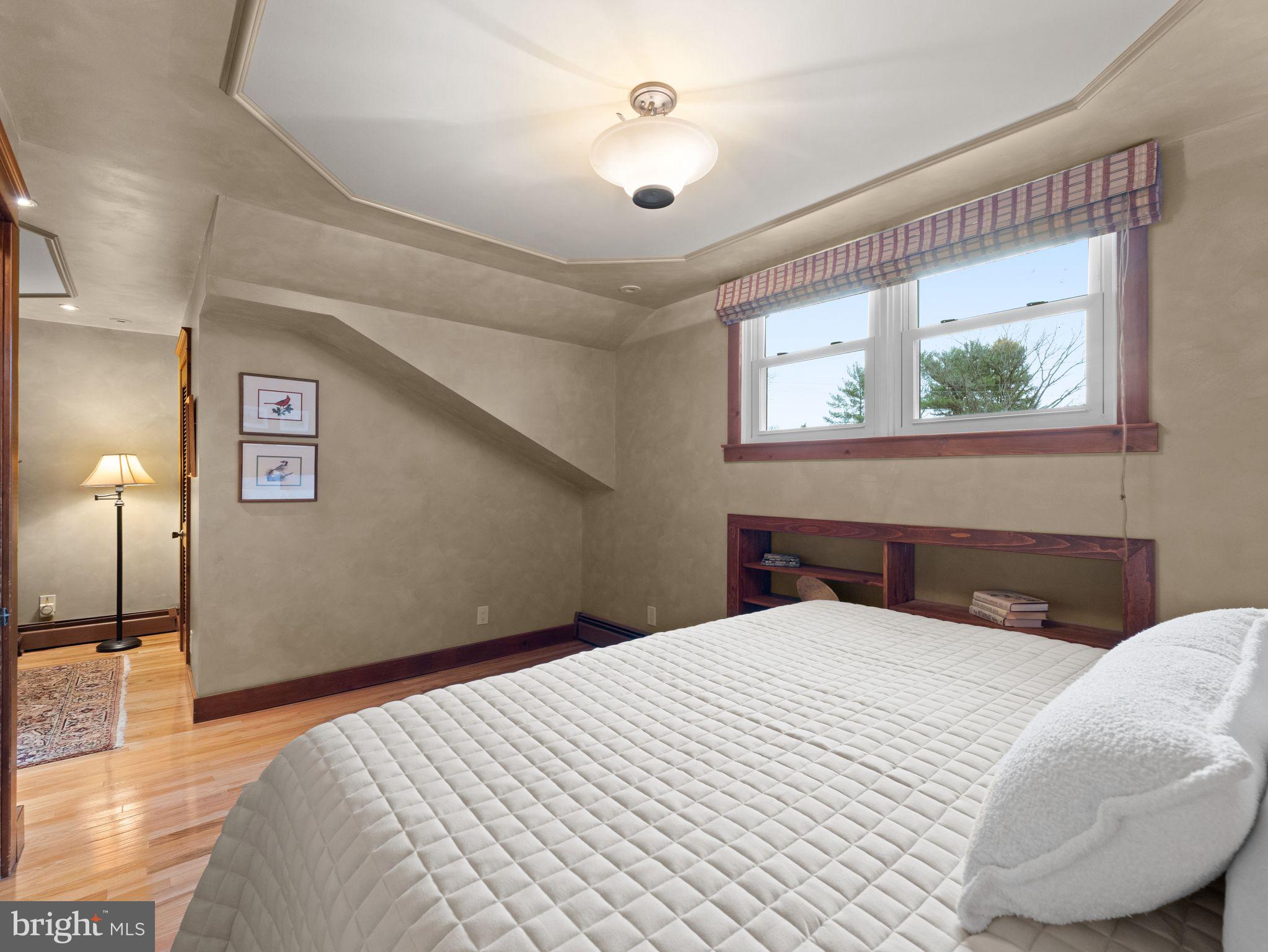 490 South Old Middletown Road Media, PA 19063 - Photo 39 of 79 a bedroom with a bed and a painting on the wall