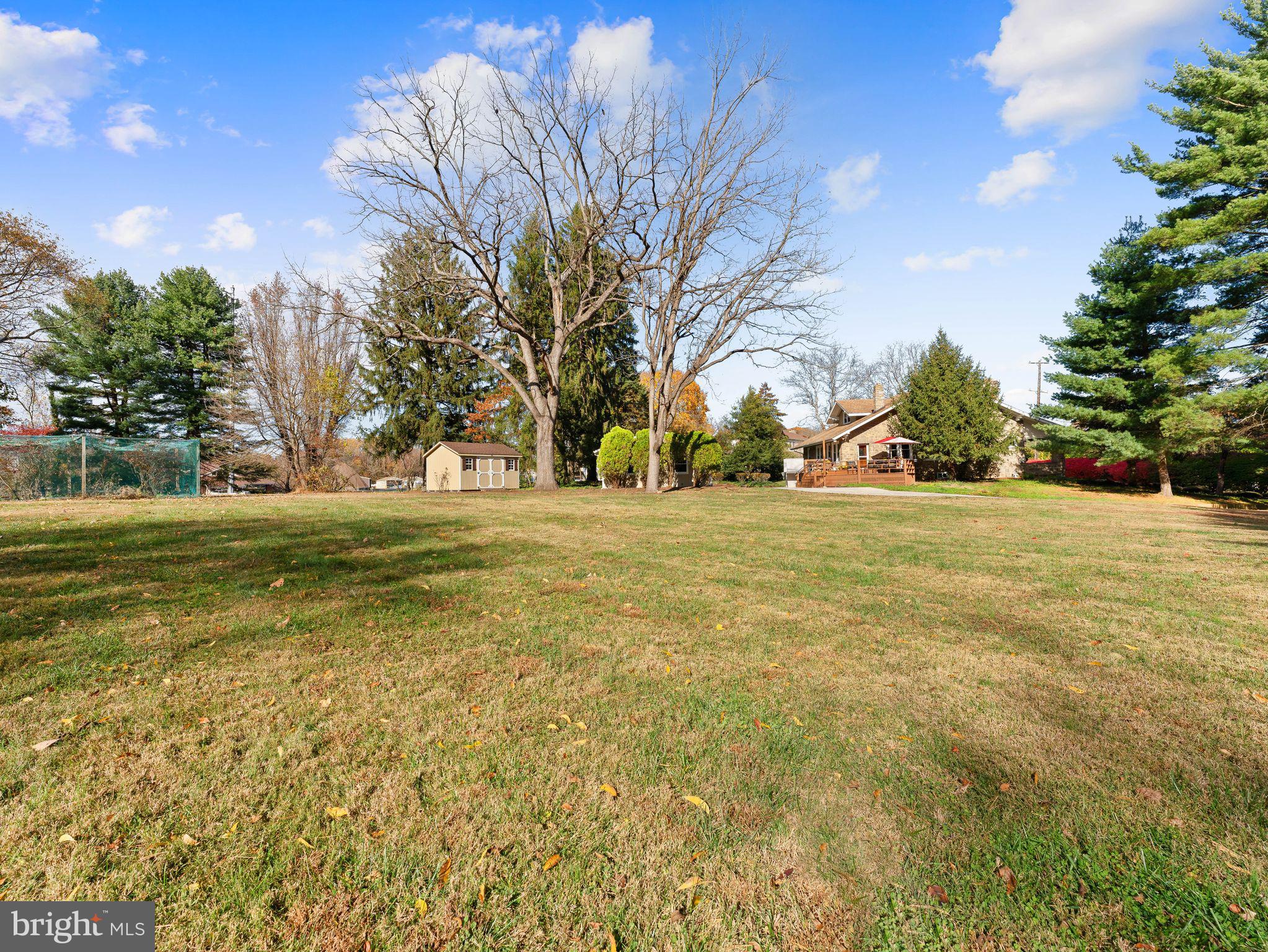 490 South Old Middletown Road Media, PA 19063 - Photo 65 of 79 a view of a green field with trees in the background