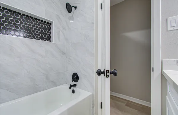 a bathroom with a bathtub