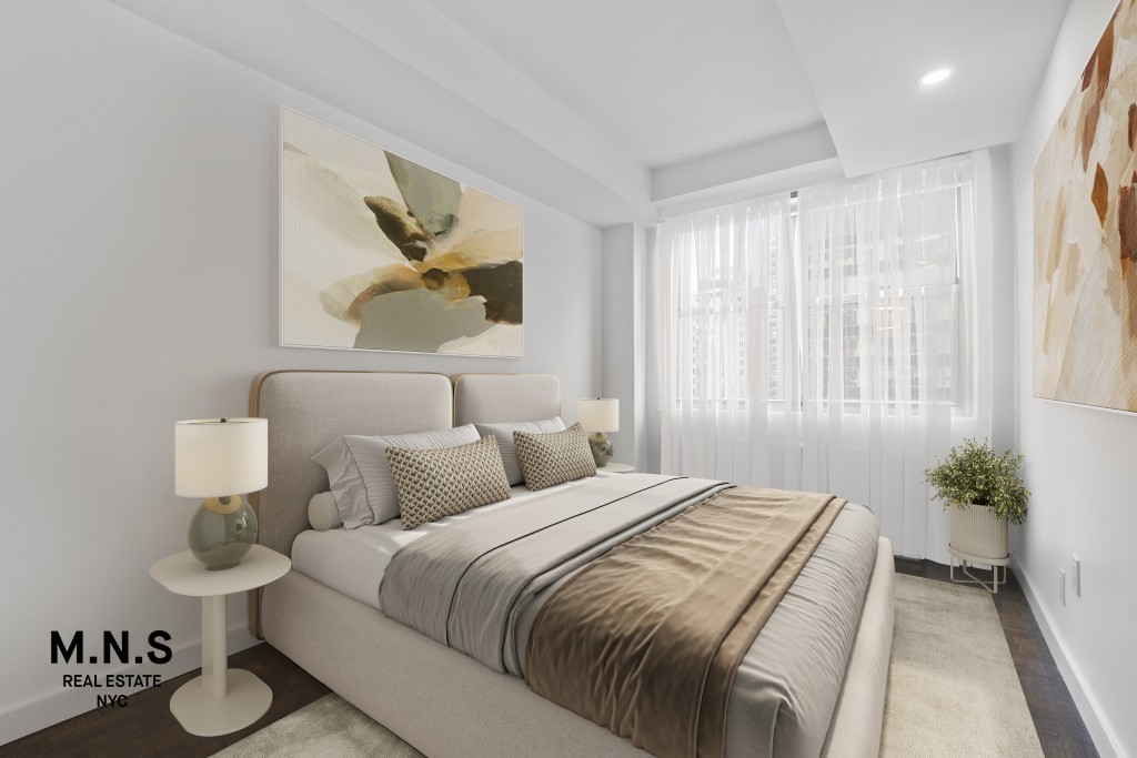 65 West 55th Street, Unit PHRE Manhattan, NY 10019 - Photo 9 of 12 a bedroom with bed and window