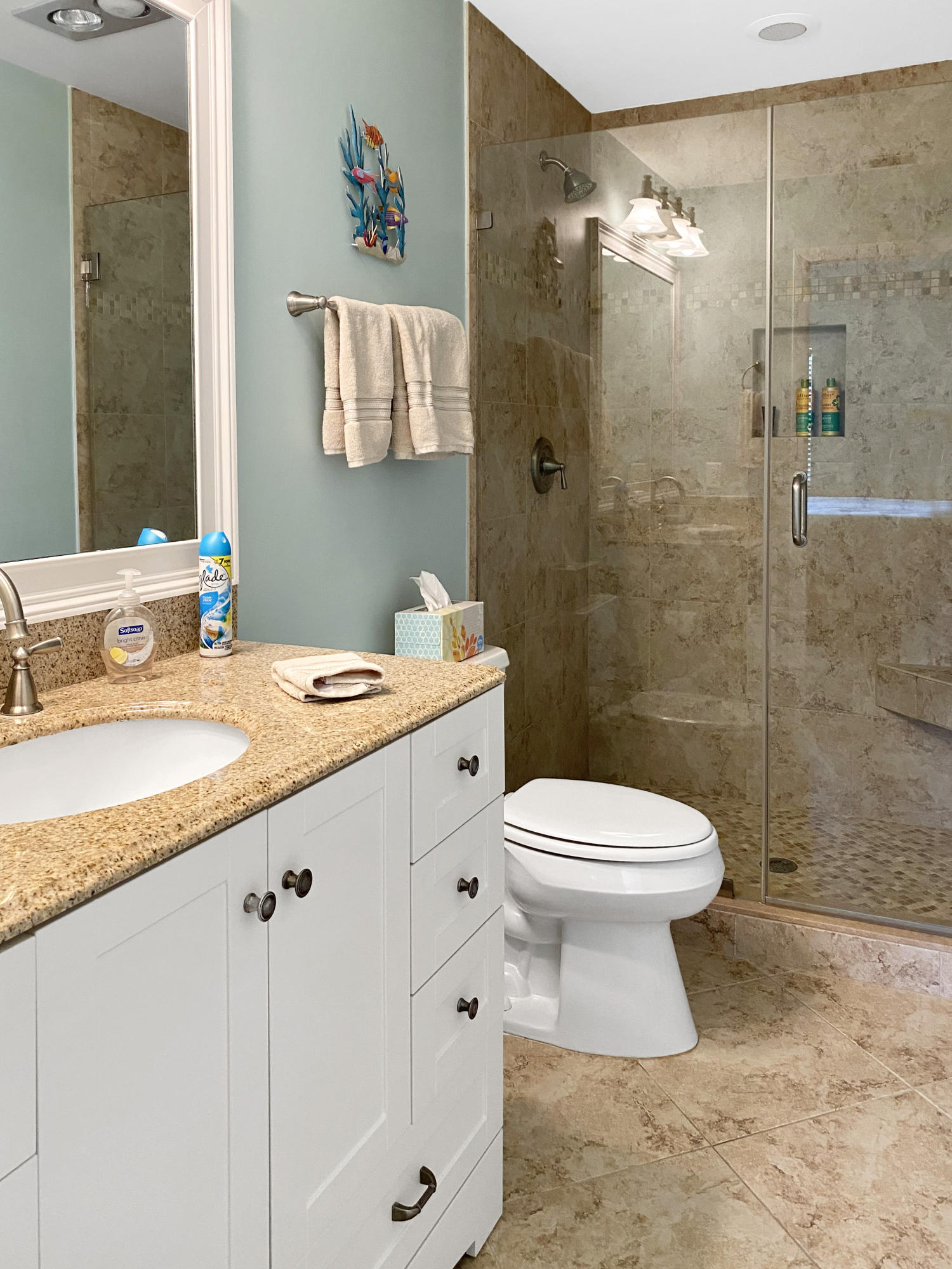275 South Beach Road, Unit B202 Jupiter, FL 33469 - Photo 14 of 25 a bathroom with a sink toilet and shower